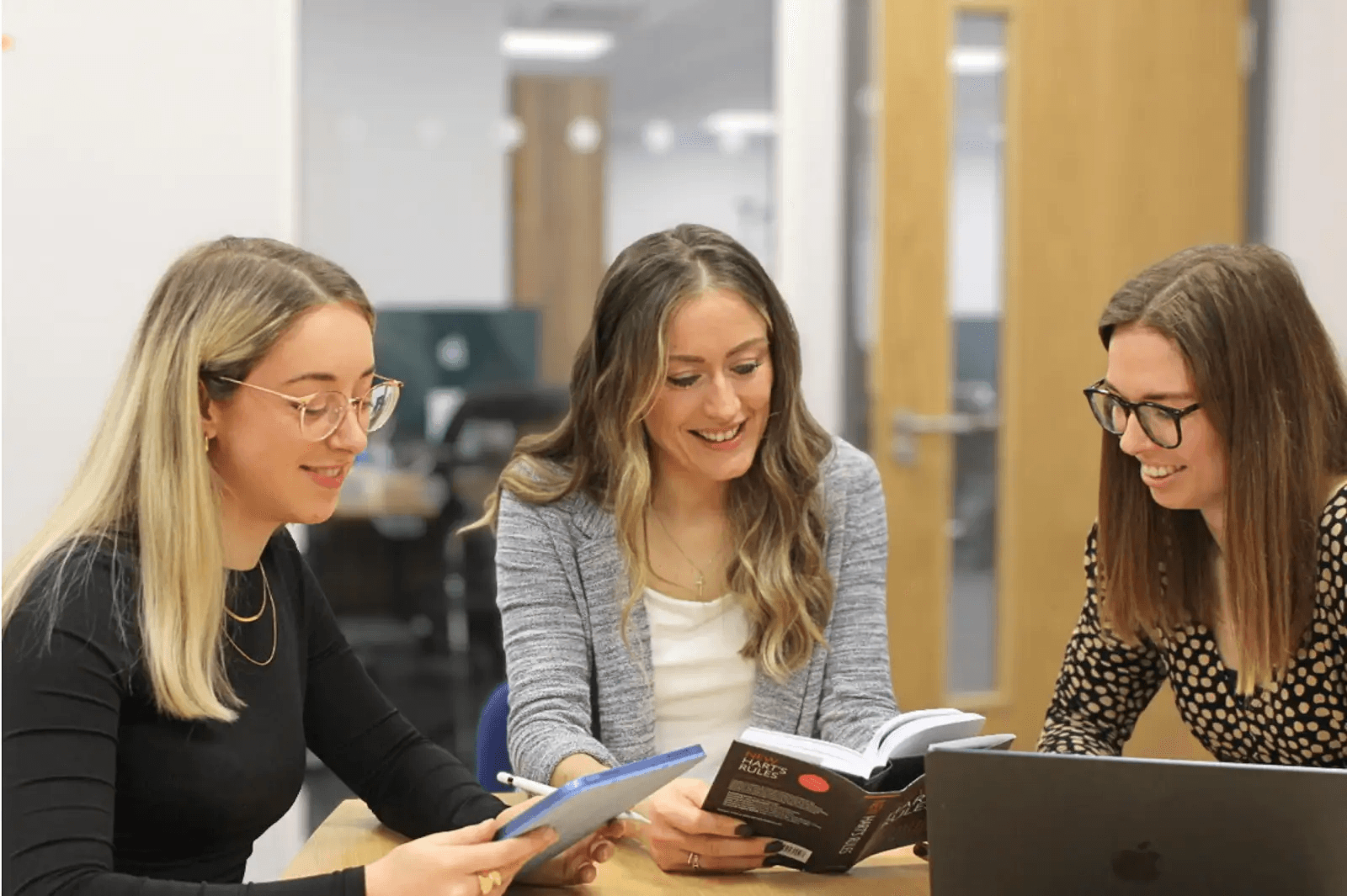 Libero editors reviewing a manuscript together